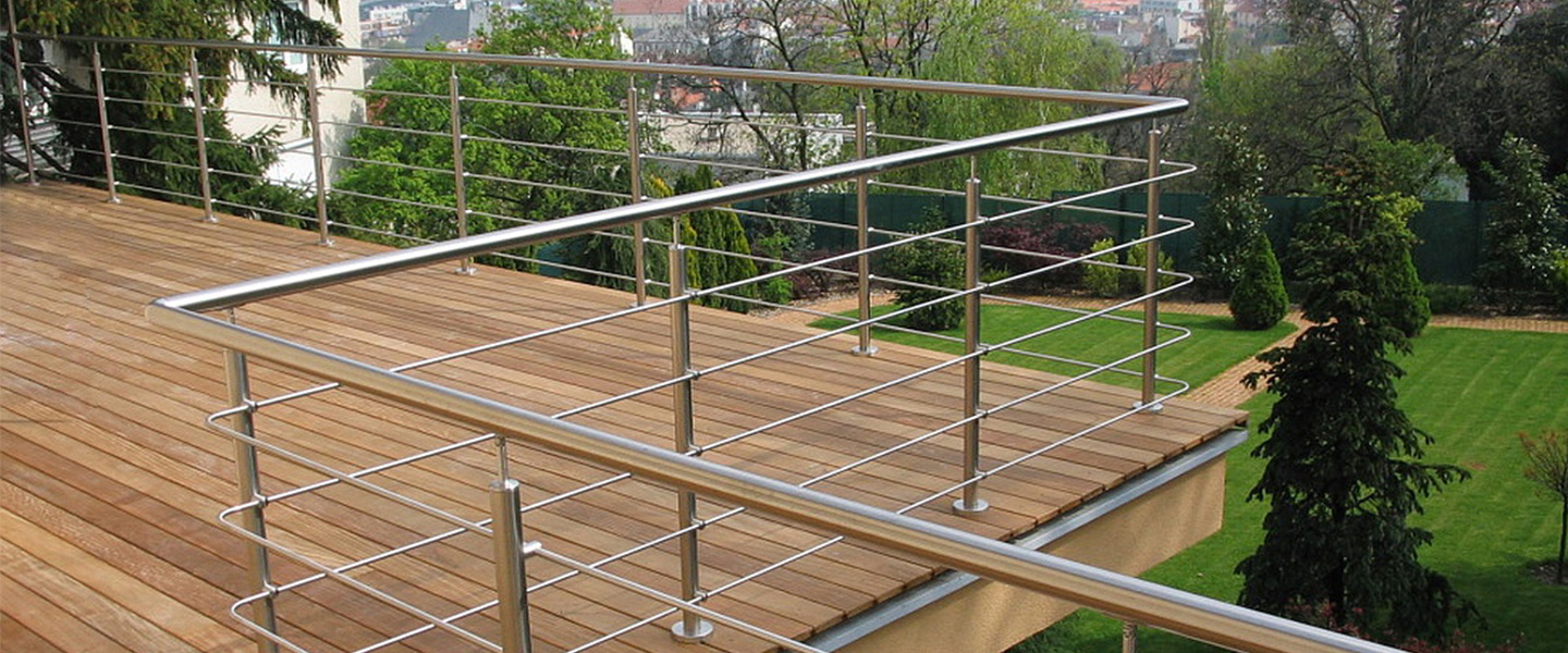 Stainless steel railings on outdoor balcony.